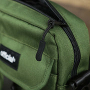The zipper on the Essential Nylon Shoulder Bag Streetwear with Mesh Pocket | Official Olive