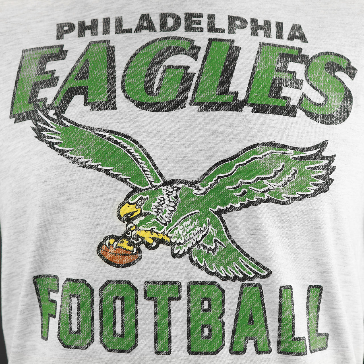 The Legacy Eagles Design on the Throwback Philadelphia Eagles Printed Legacy 1987 Eagles Logo Tshirt | Relay Gray Tshirt