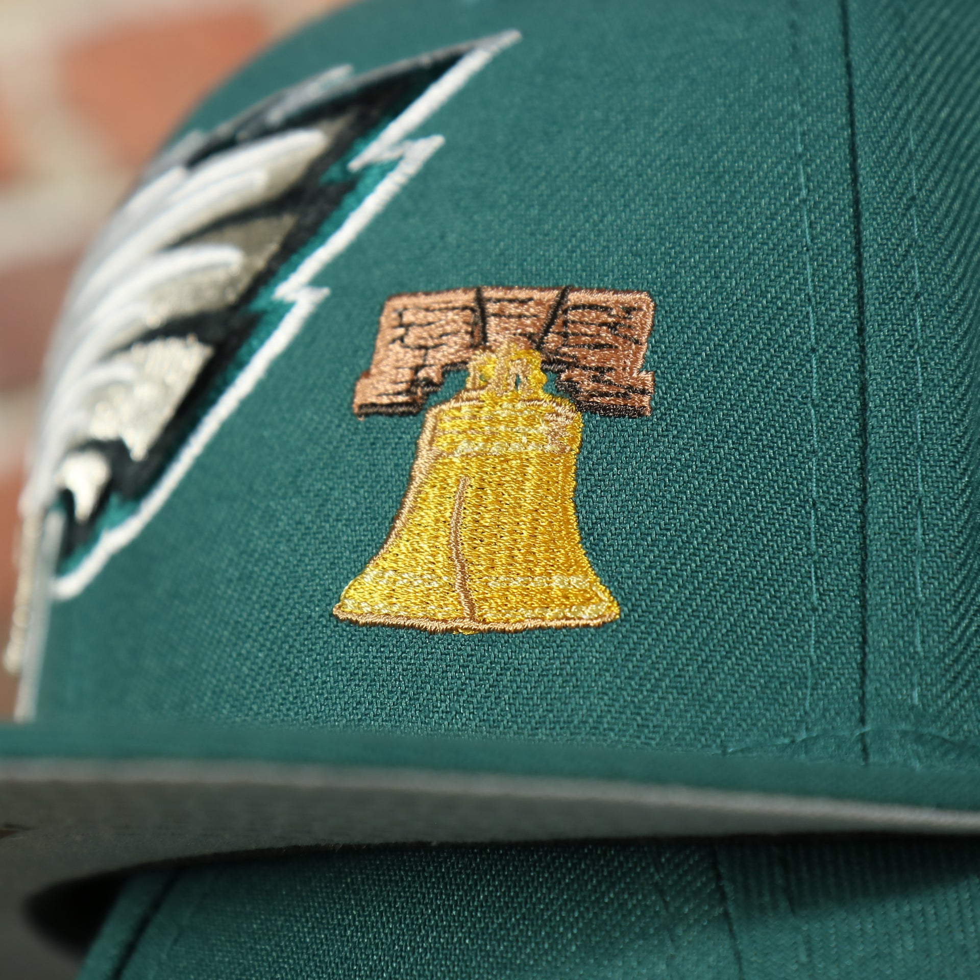 liberty bell patch on the Philadelphia Eagles City Transit All Over Side Patch Gray Bottom 59Fifty Fitted Cap