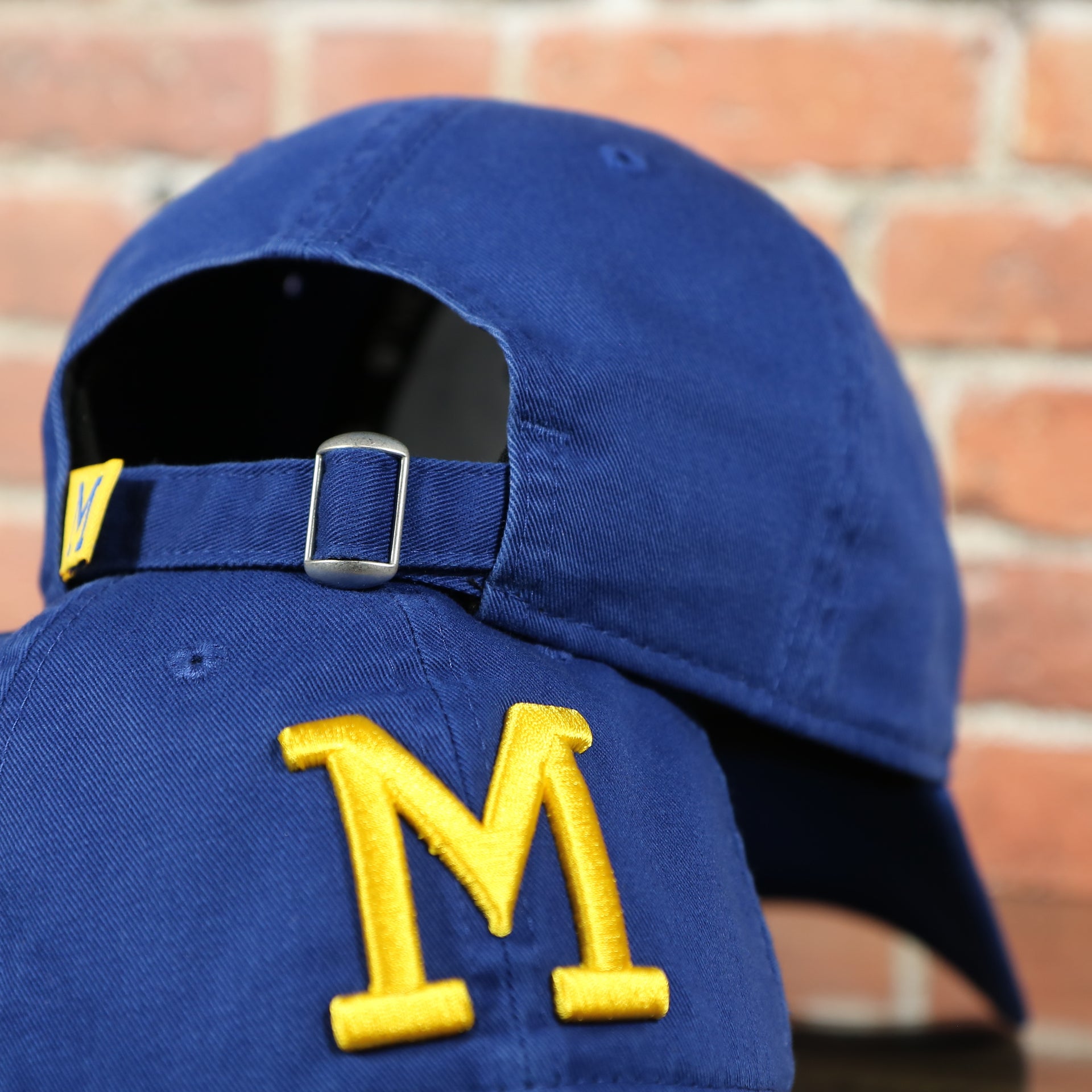 back side of the Milwaukee Brewers 1970 Throwback Blue Adjustable Dad Hat OSFM