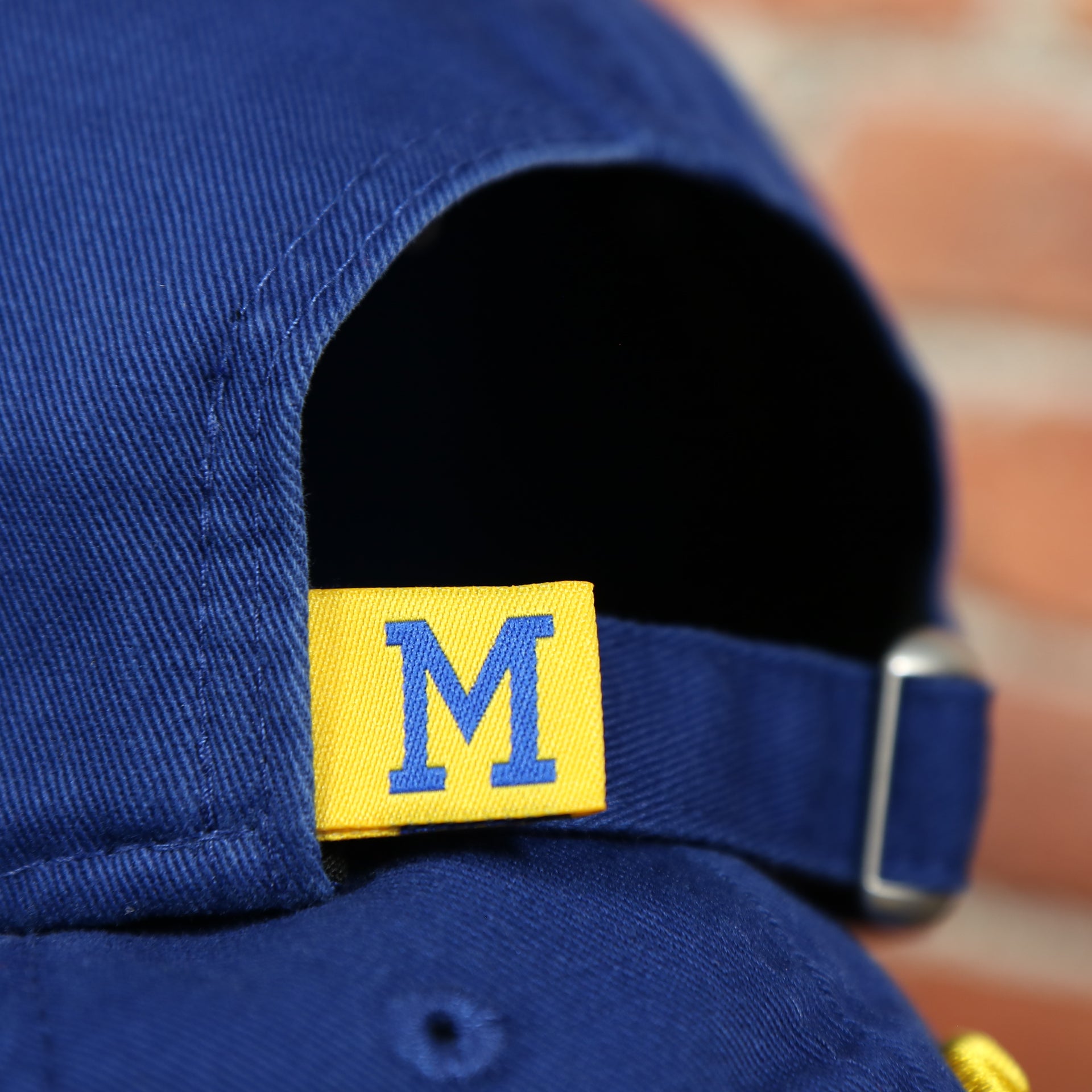 tag on the backside of the Milwaukee Brewers 1970 Throwback Blue Adjustable Dad Hat OSFM