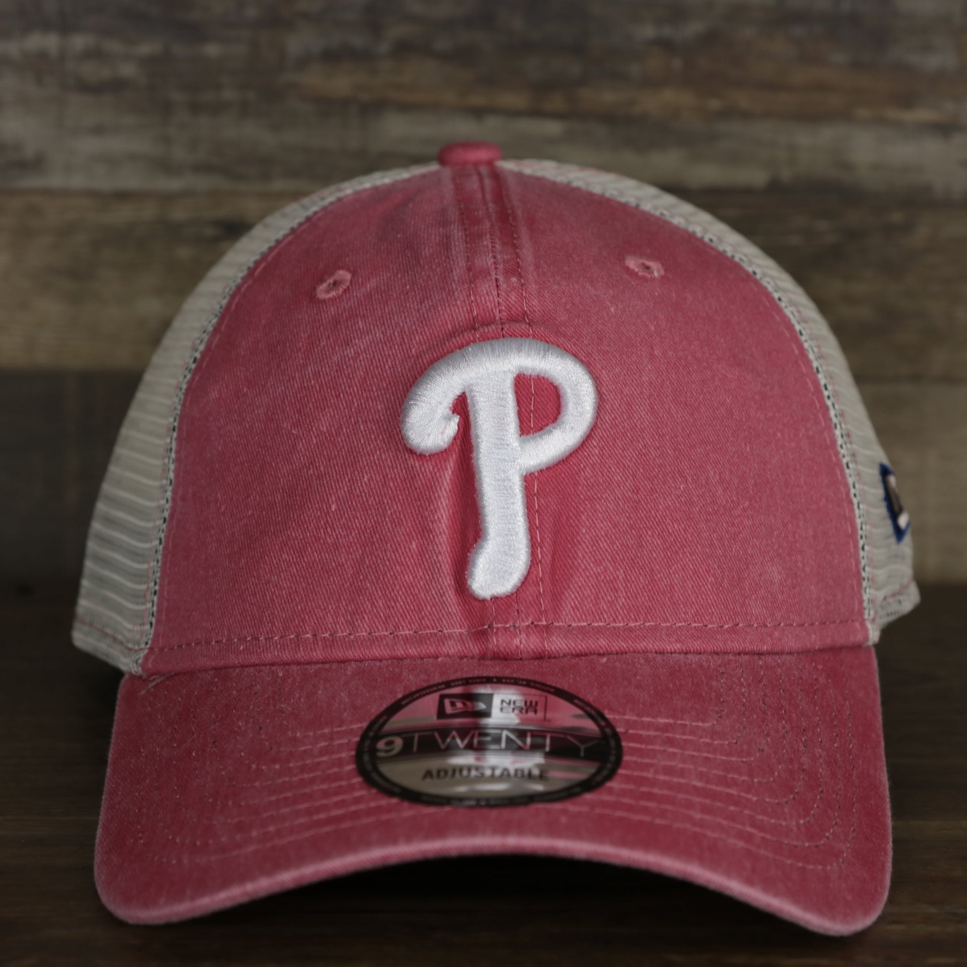 The front of the Philadelphia Phillies New Era 9Twenty Washed Trucker hat