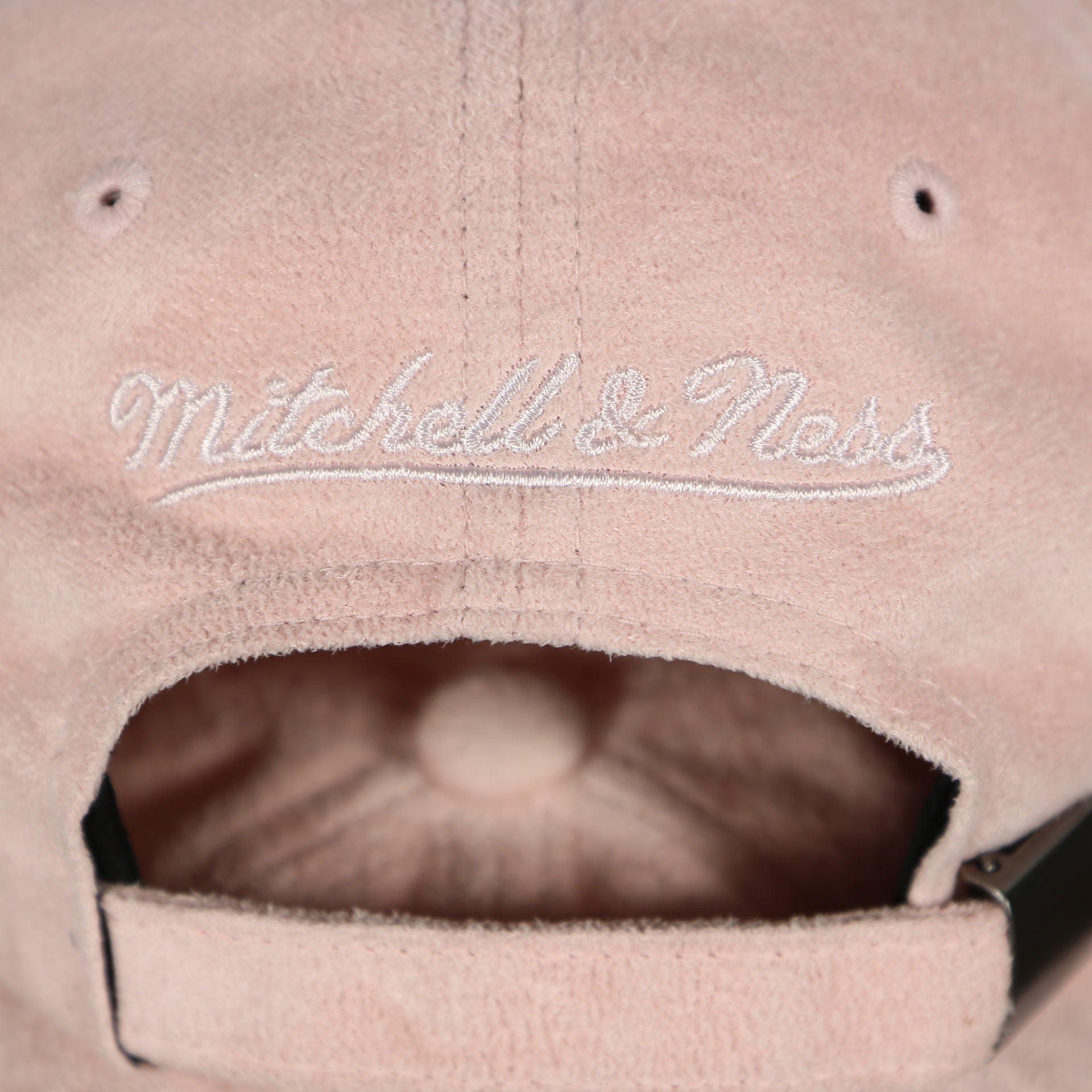 mitchell and ness logo on the Golden State Warriors Microsuede Pink Adjustable Dad Hat