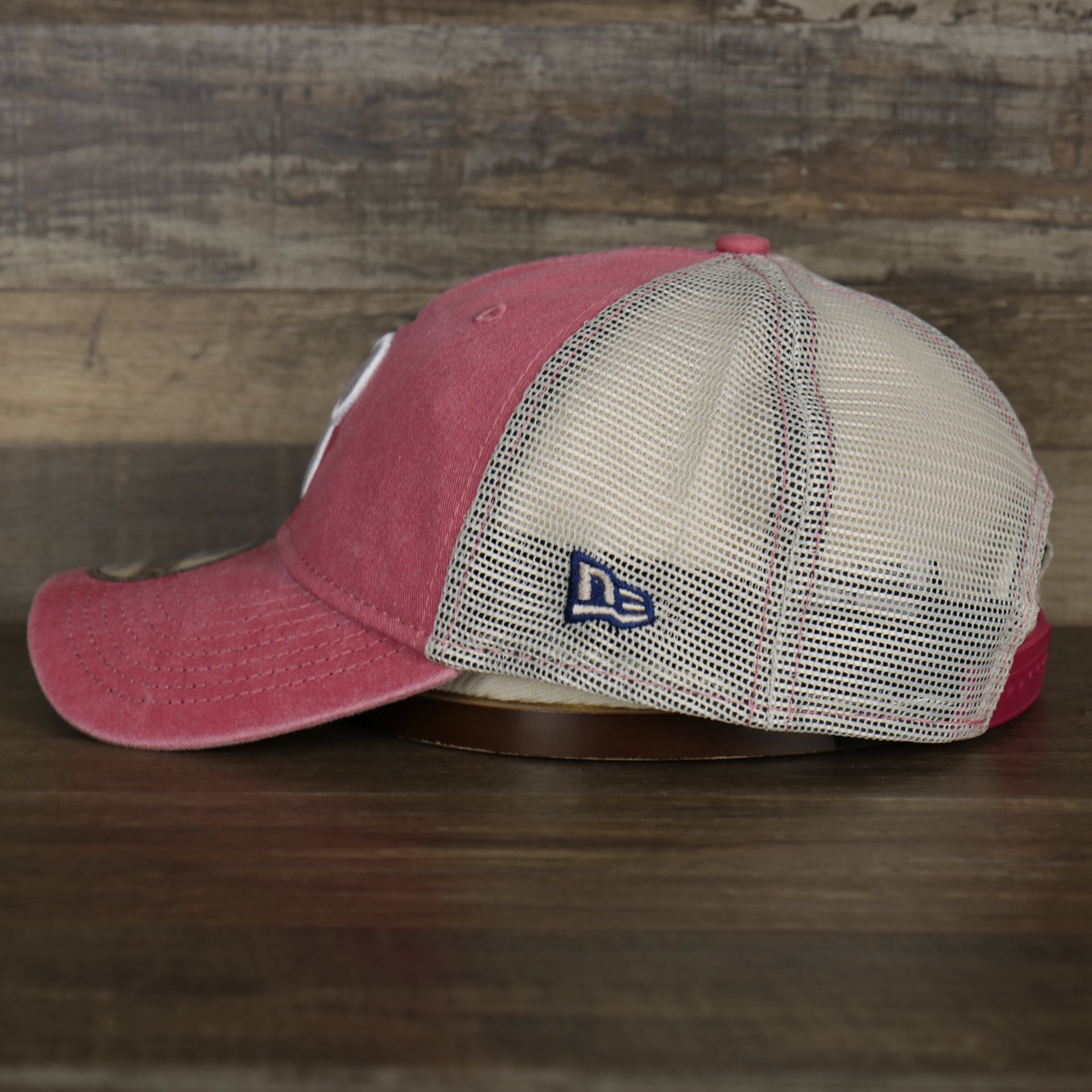The wearer's left on the Philadelphia Phillies New Era 9Twenty Washed Trucker hat