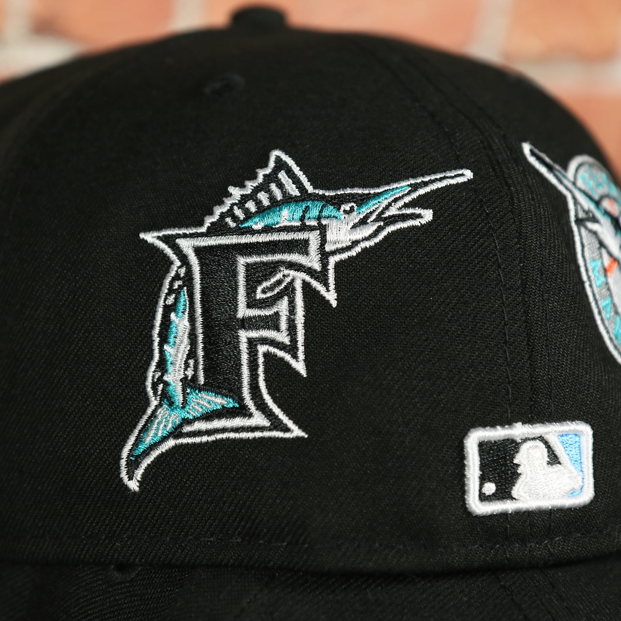 throwback marlins logo on the Miami Marlins "Patch Pride" All Over Gray Bottom Side Patch 59Fifty Fitted Cap