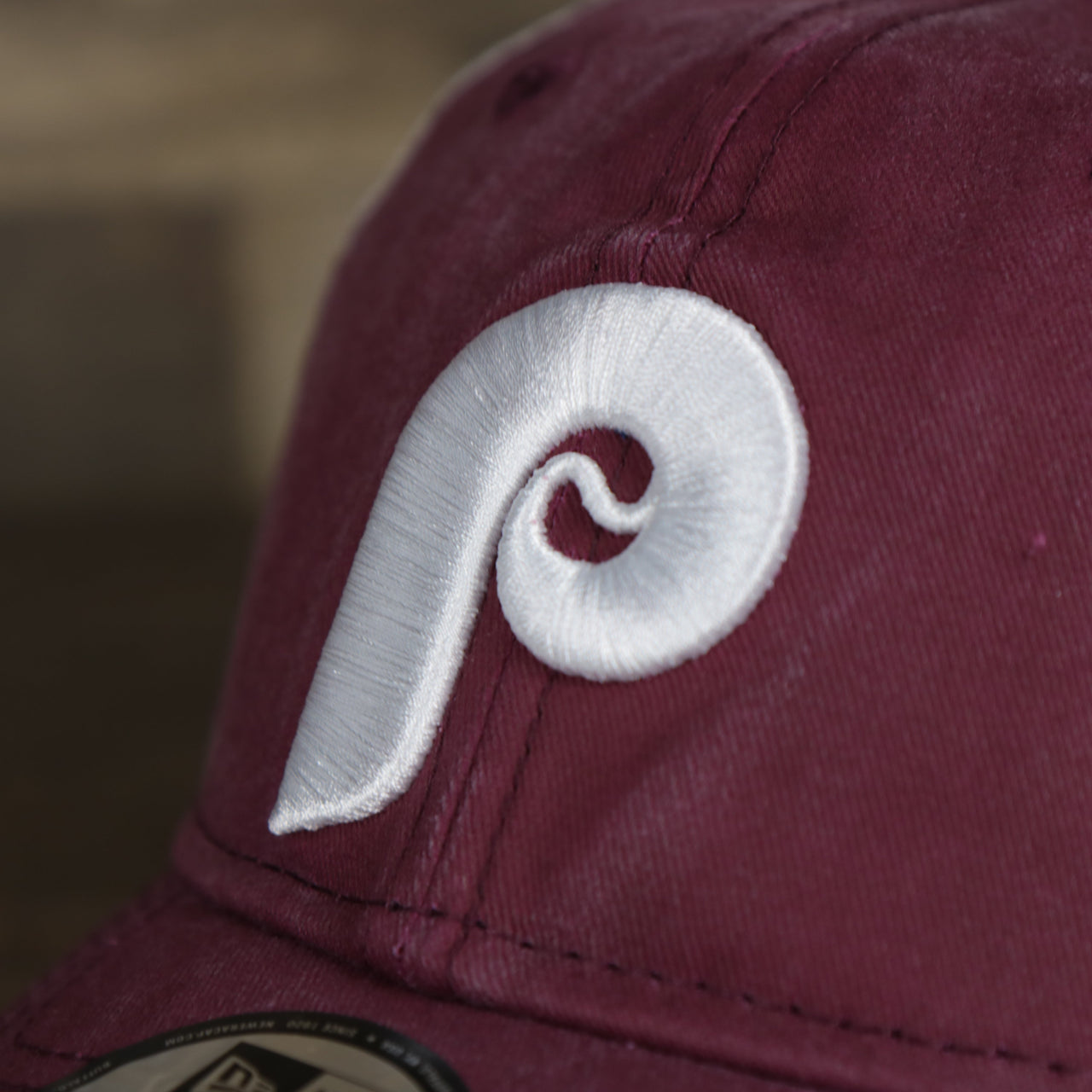 A close up of the Phillies Cooperstown on the Philadelphia Phillies Cooperstown New Era 9Twenty Washed Trucker hat