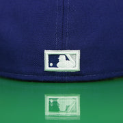 mlb logo on the back of the Chicago Cubs Cooperstown Blue 59FIFTY Green Bottom Fitted Cap | Blue