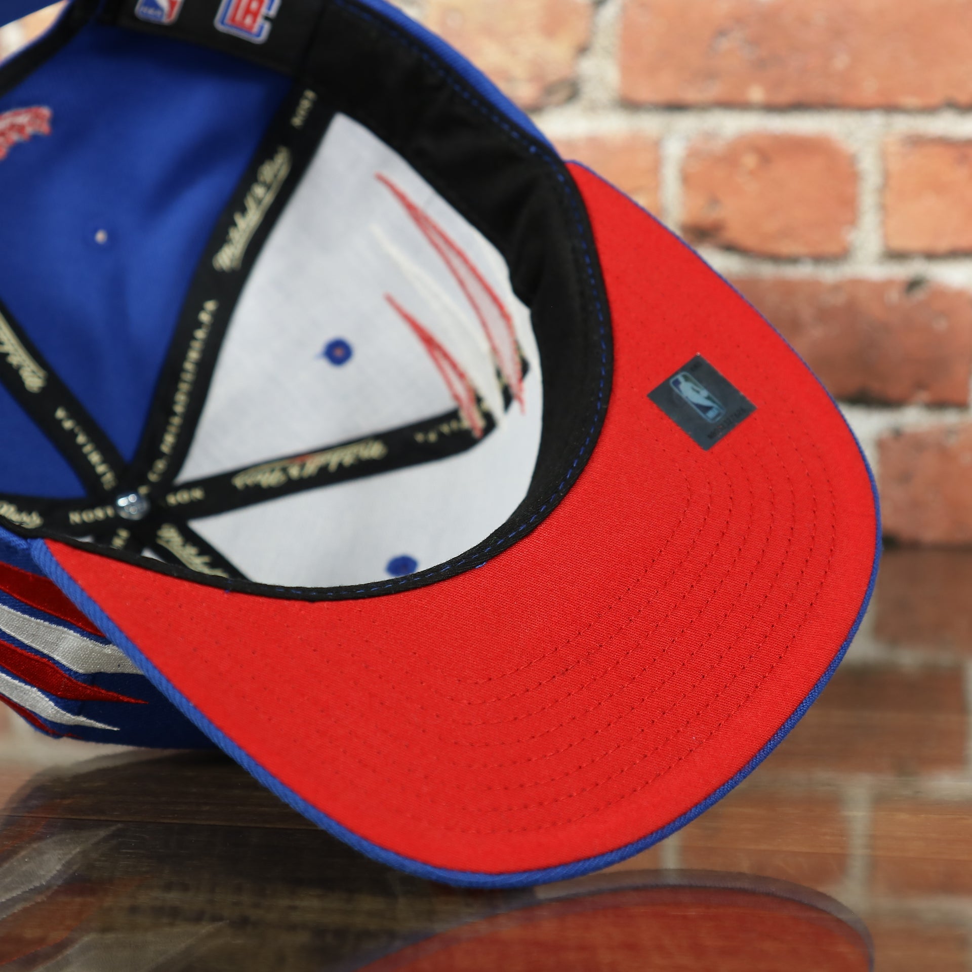 red under visor on the Los Angeles Clippers Diamond Spikes Blue Snapback Hat