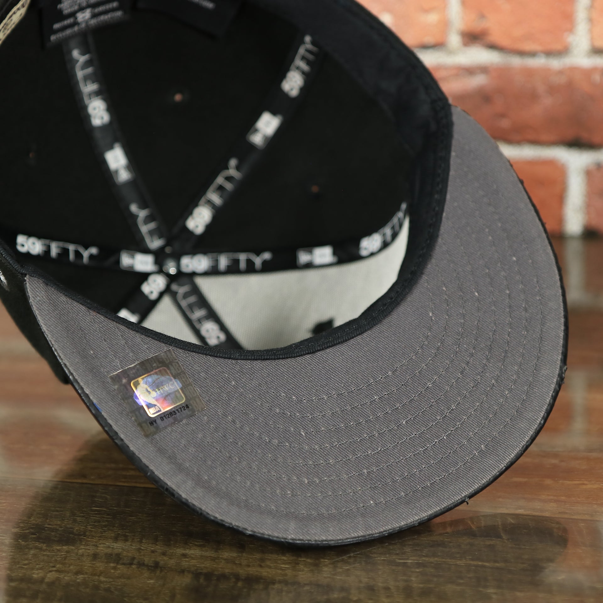 under side of the Chicago Bulls Black 59FIFTY Grey Bottom Fitted Cap | Black