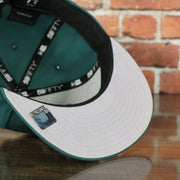 grey under visor on the EAGLES Fitted hat on field current logo pine green colorway with metallic and white logo | 59FIFTY (5950) FITTED CAP | PINE NEEDLE GREEN