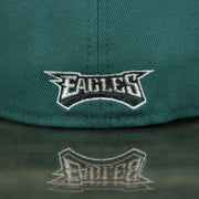 eagles lettering on the EAGLES Fitted hat on field current logo pine green colorway with metallic and white logo | 59FIFTY (5950) FITTED CAP | PINE NEEDLE GREEN