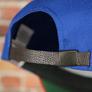 adjustable strap on the back of the Texas Rangers Cooperstown American Needle Green Bottom Throwback Blue Wool Dad Hat | OSFM