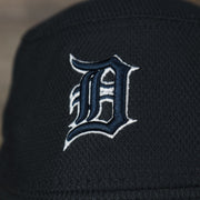 A close up of the Tigers logo on the Detroit Tigers MLB 2022 Spring Training Onfield Bucket Hat