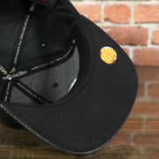 black under visor on the Miami Heat Perforated Leather Snapback | Black Miami Heat Snap Back with Racing Leather