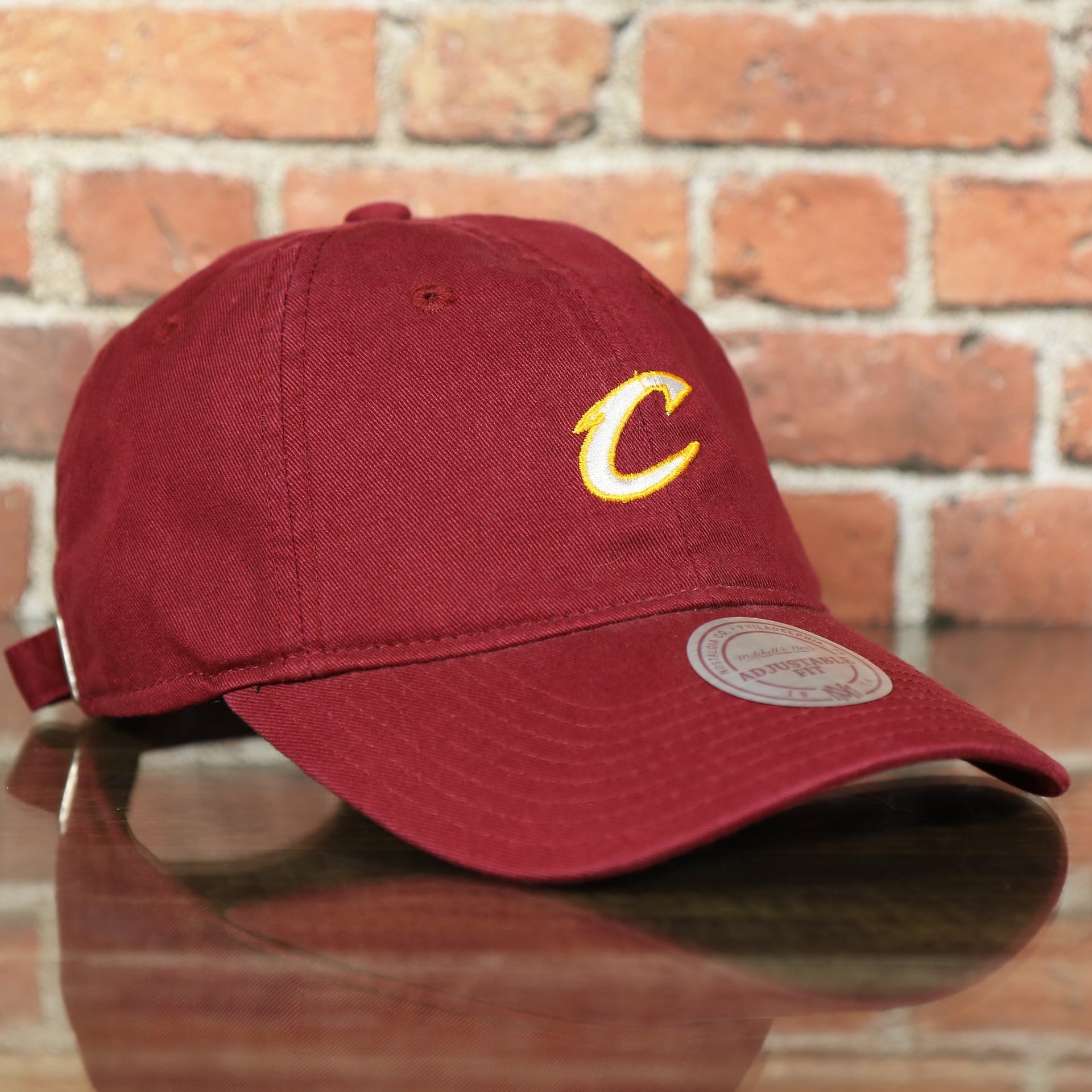 front of the Cleveland Cavaliers Maroon Dad Hat | Maroon Mitchell and Ness Adjustable Baseball Cap