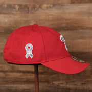 The right side of the Philadelphia Phillies red 2021 MLB fathers day 9twenty dad hat by New Era.