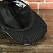 black under visor on the Huf 100% Genuine Lambskin Leather Black Five Panel Strapback Hat