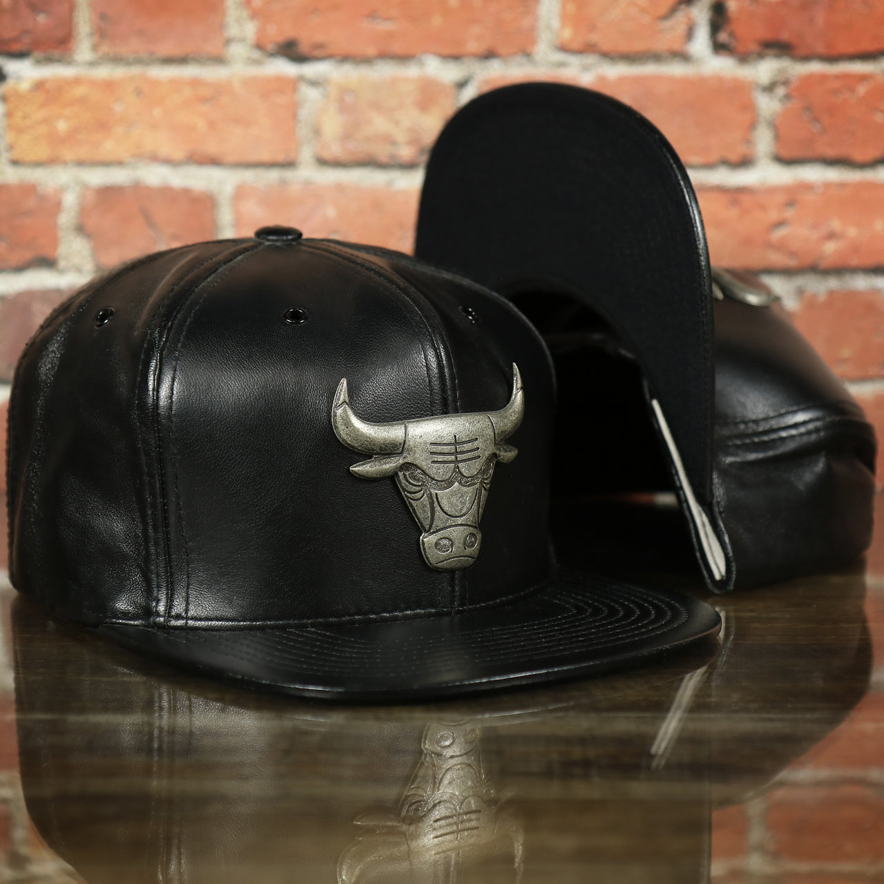 Chicago Bulls 100% Genuine Lambskin Leather Metallic Embossed Bull Logo Mitchell and Ness Black Snapback Hat