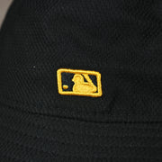 A close up of the MLB Batterman logo on the Pittsburgh Pirates MLB 2022 Spring Training Onfield Bucket Hat