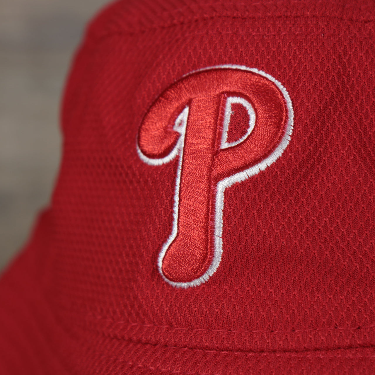 A close up of the Phillies logo on the Philadelphia Phillies MLB 2022 Spring Training Onfield Bucket Hat