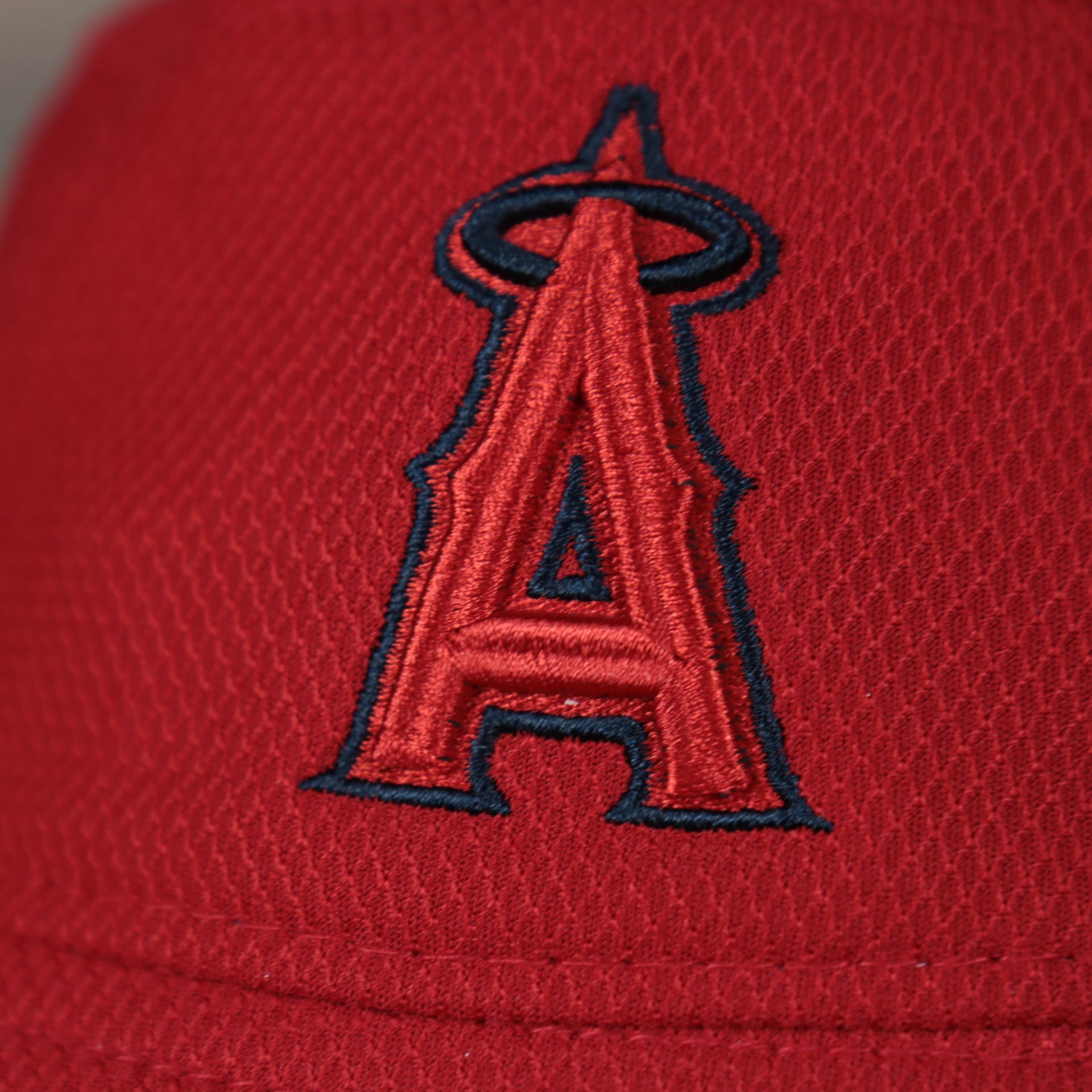 A close up of the Angles logo on the Anaheim Angels MLB 2022 Spring Training Onfield Bucket Hat