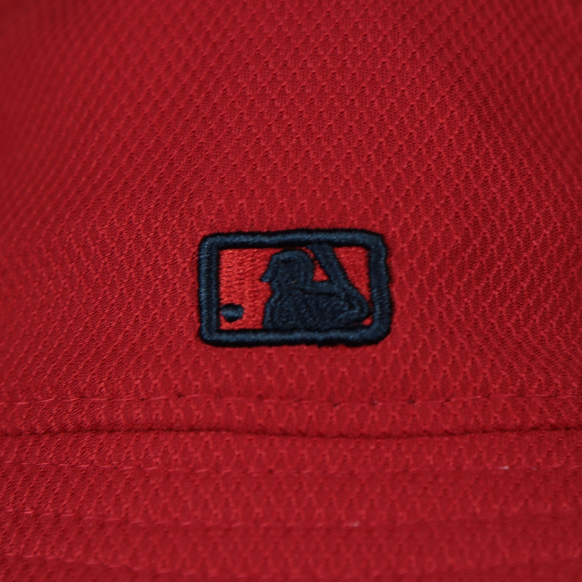 A close up of the MLB Batterman logo on the Anaheim Angels MLB 2022 Spring Training Onfield Bucket Hat