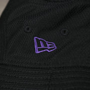 A close up of the New Era logo on the Colorado Rockies MLB 2022 Spring Training Onfield Bucket Hat
