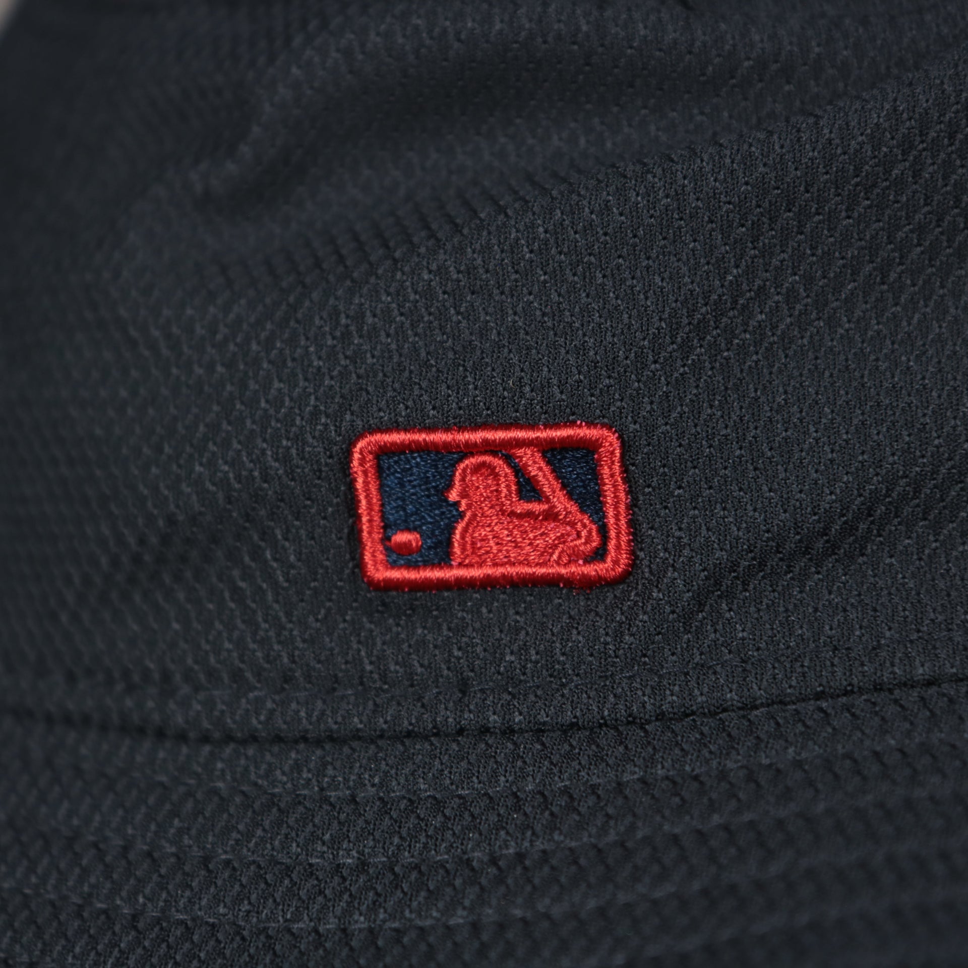 A close up of the MLB Batterman on the Atlanta Braves MLB 2022 Spring Training Onfield Bucket Hat