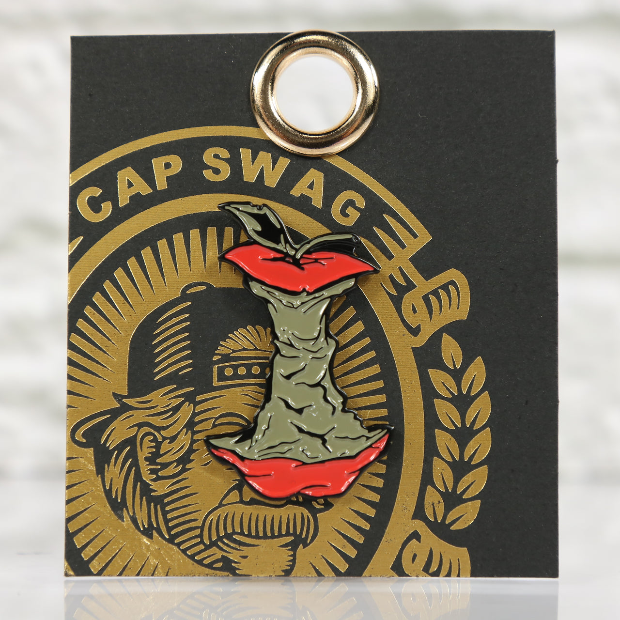 front of the New York Rotten Apple Fitted Cap Pin | Enamel Pin For Hat