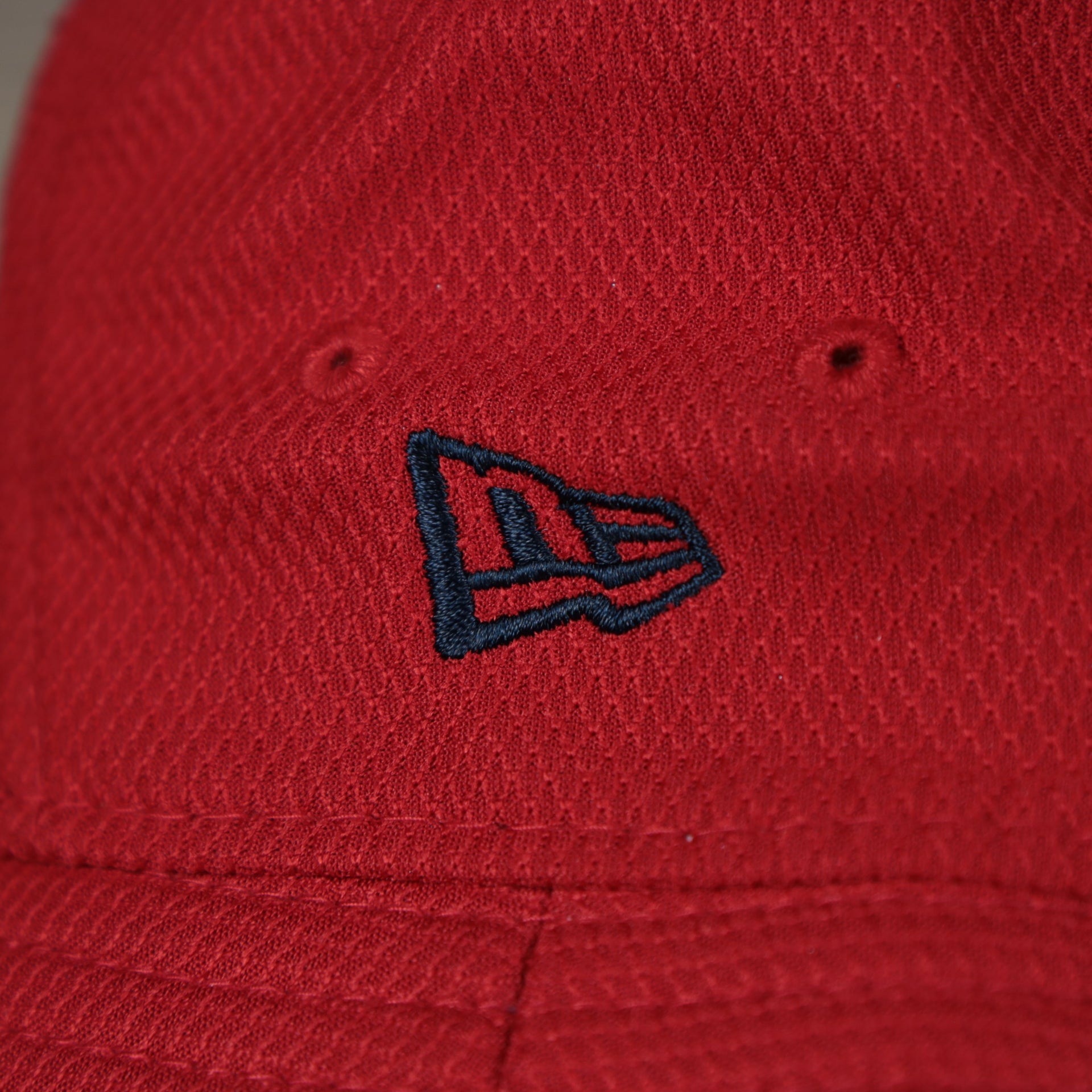 A close up of the New Era logo on the Washington Nationals MLB 2022 Spring Training Onfield Bucket Hat