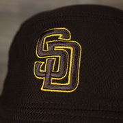 A close up of the Padres logo on the San Diego Padres MLB 2022 Spring Training Onfield Bucket Hat