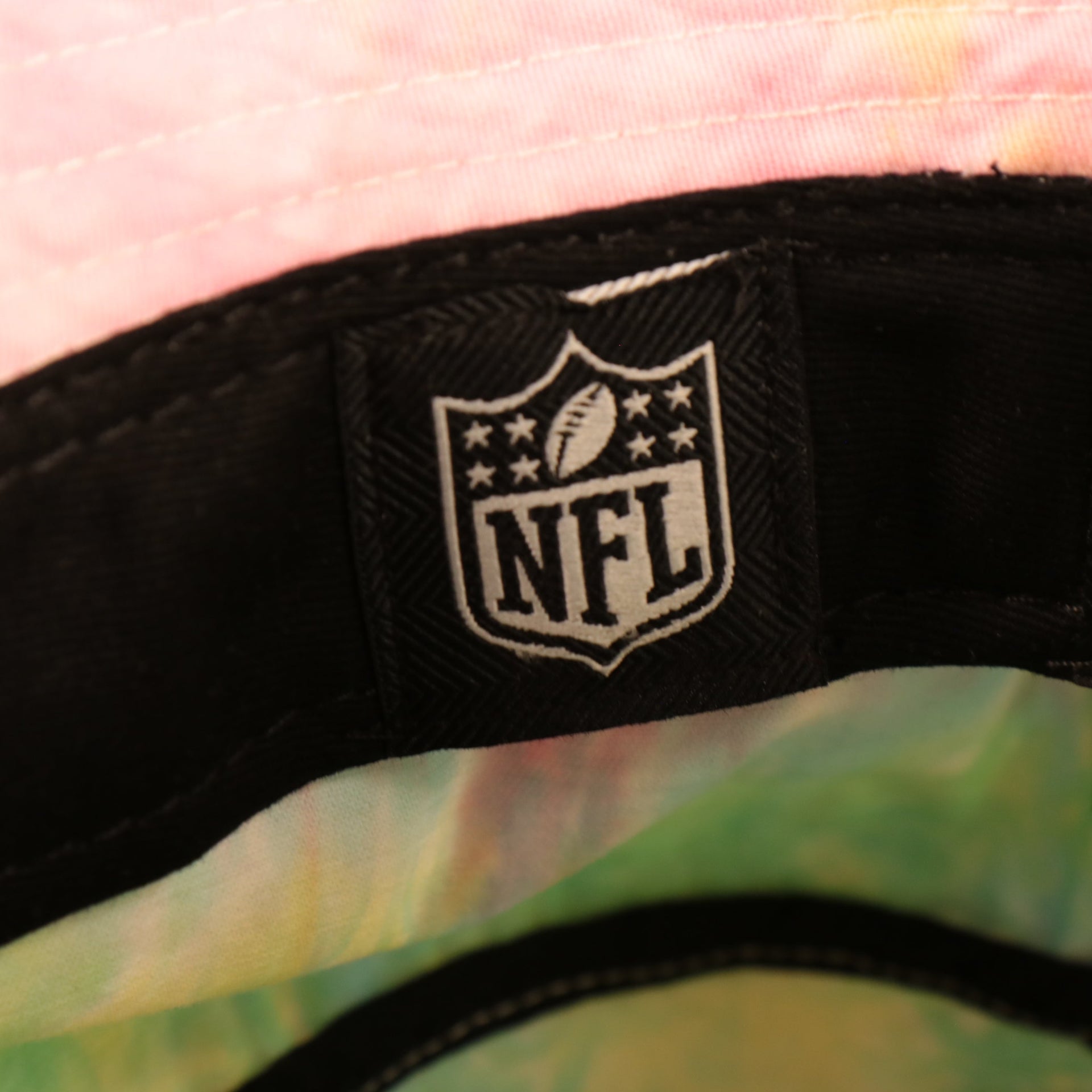 nfl logo on the Philadelphia Eagles Tie Dye Bucket Hat 