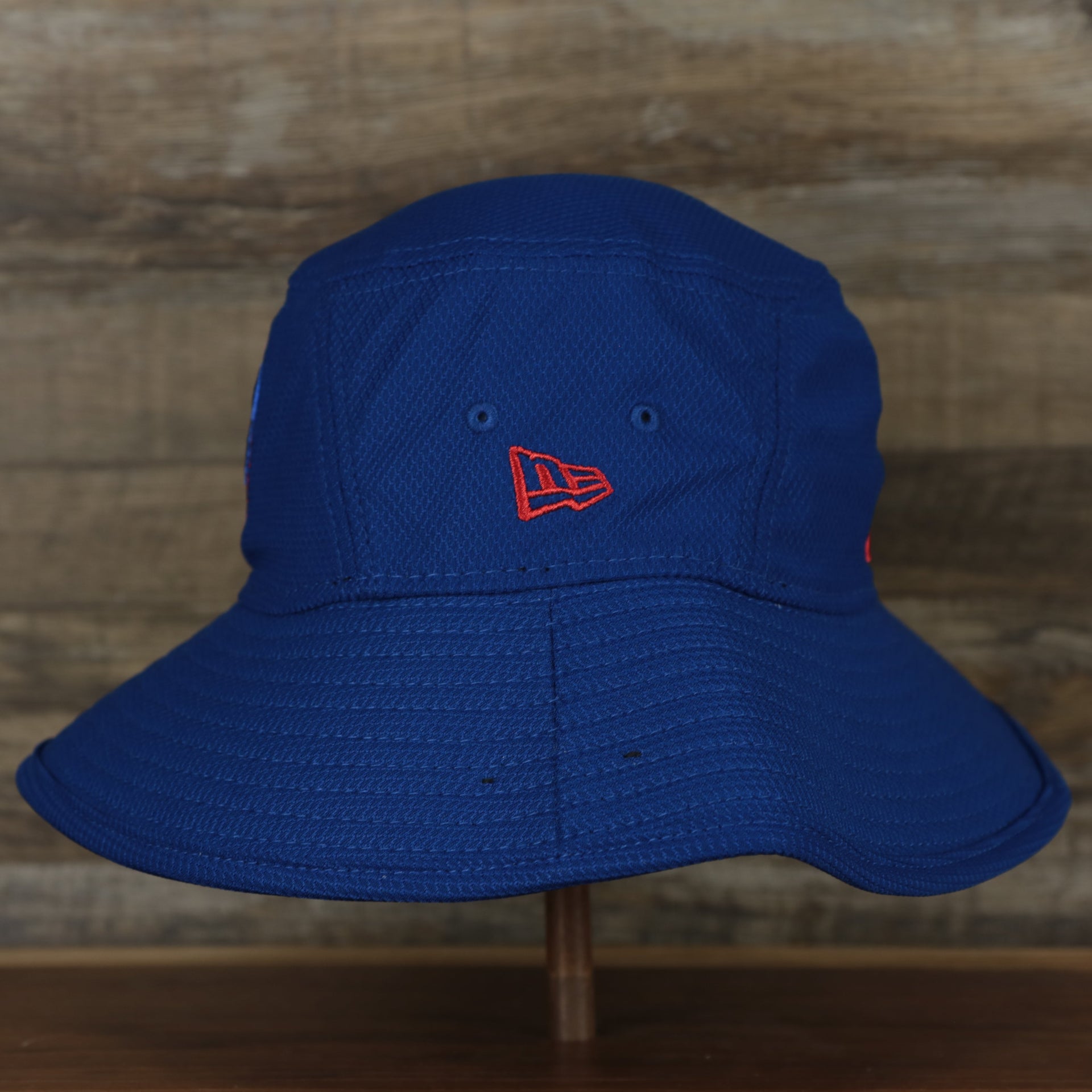 The wearer's left on the Chicago Cubs MLB 2022 Spring Training Onfield Bucket Hat