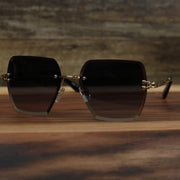The Large Lightweight Frame Black Lens Sunglasses with Gold Frame
