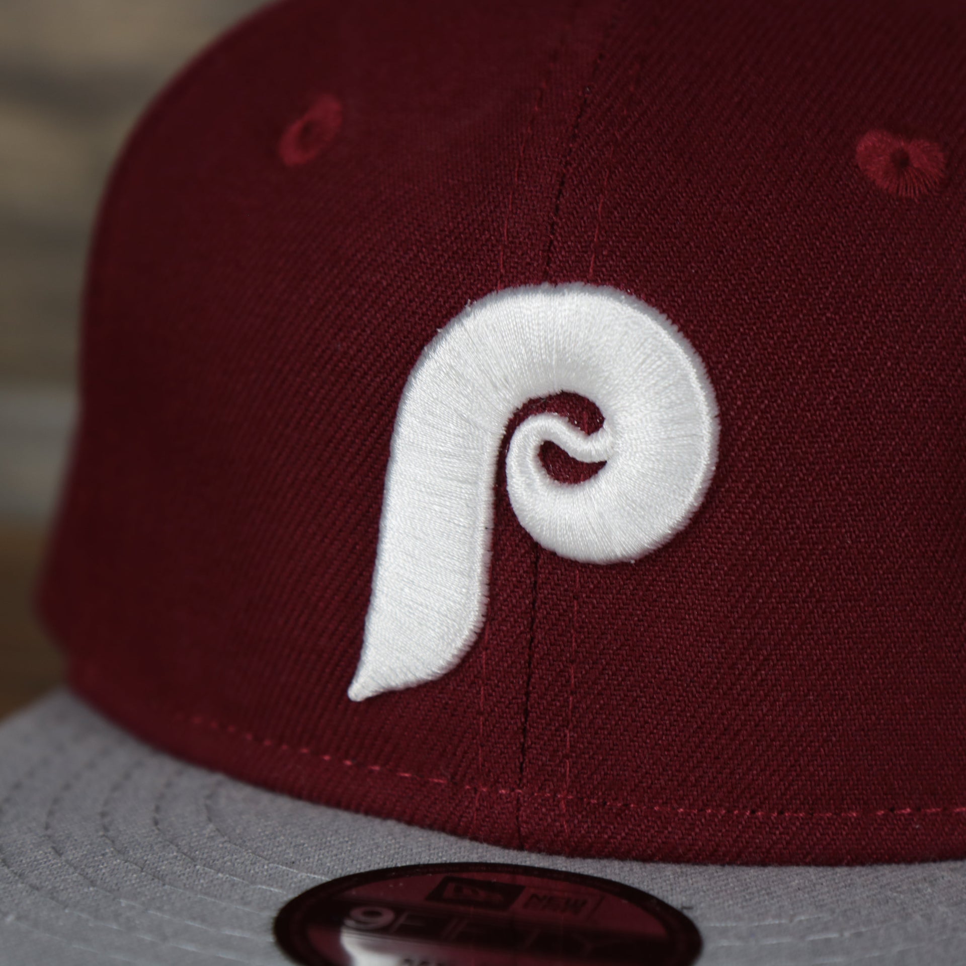 A close up of the logo on the Philadelphia Phillies Cooperstown My 1st 9Fifty Snapback