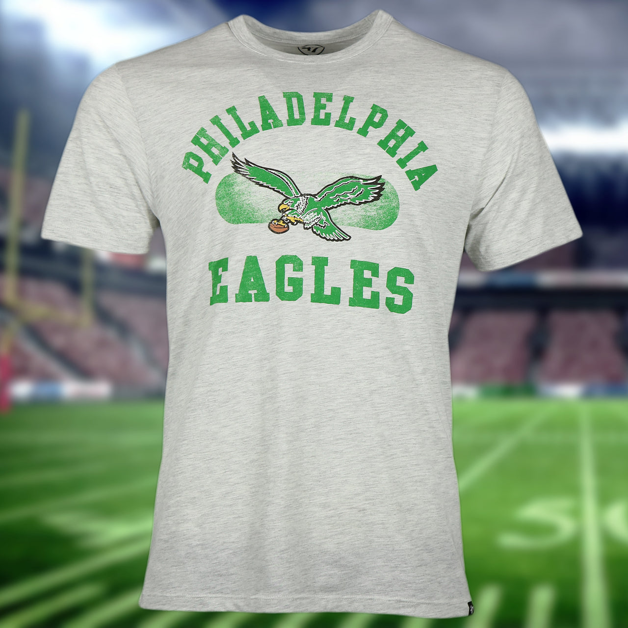 front of the Philadelphia Eagles Distressed Throwback Kelly Green Bird Logo Gray Brisk Franklin  T-Shirt