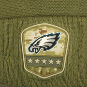 The Eagles Logo on the Philadelphia Eagles Salute To Service Ribbon Rubber Military Eagles Patch On Field NFL Beanie | Military Green Beanie