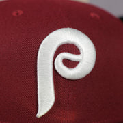 phillies logo on the Philadelphia Phillies 1970s Cooperstown Vintage Cardinal Red New Era 59Fifty Fitted Cap