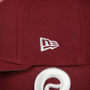 new era logo on the Philadelphia Phillies 1970s Cooperstown Vintage Cardinal Red New Era 59Fifty Fitted Cap