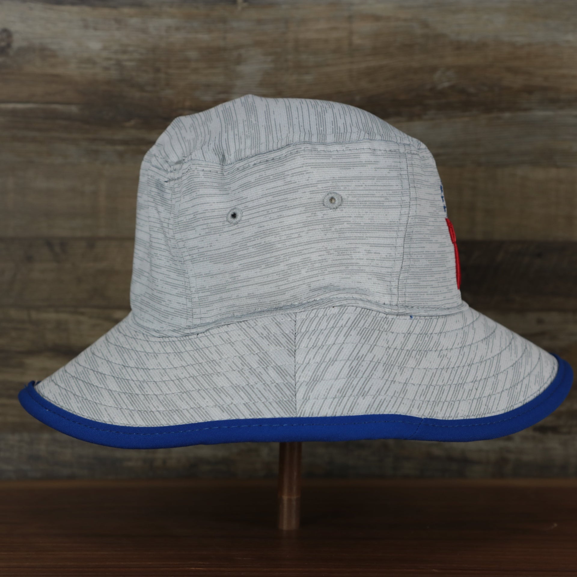 The wearer's right on the Philadelphia 76ers New Era Bucket Hat