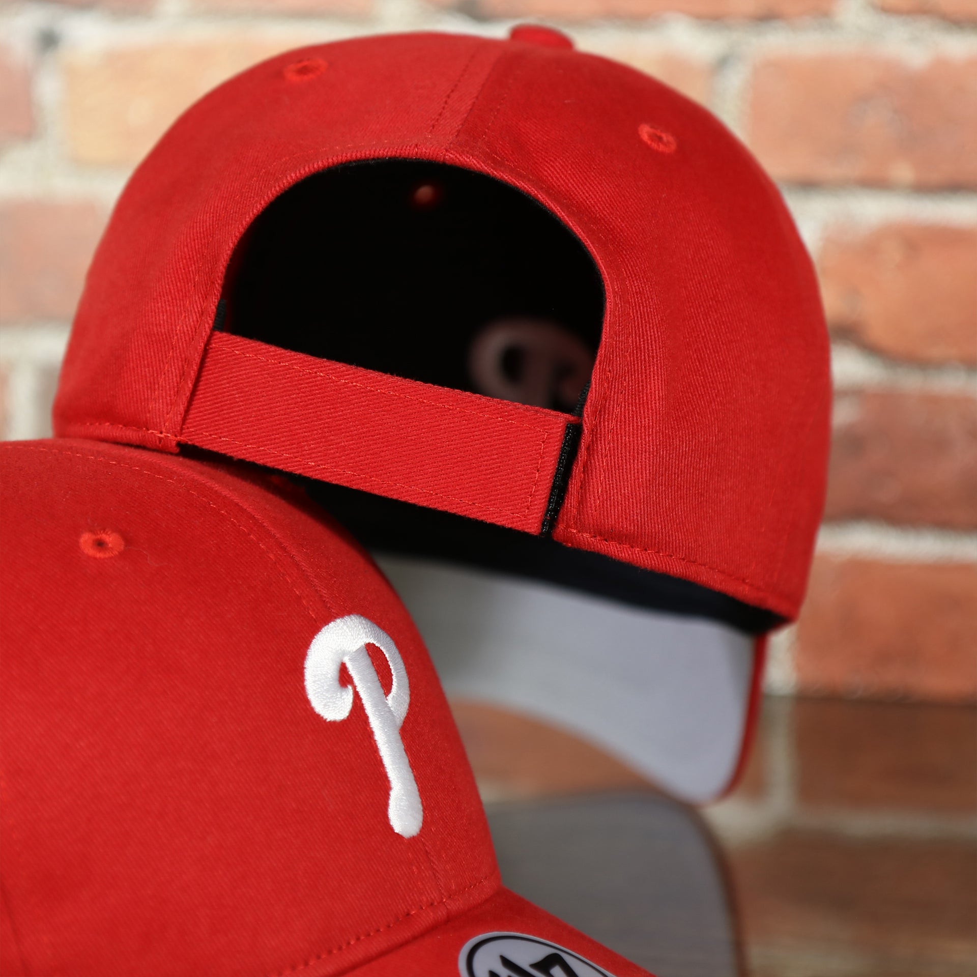 red adjustable strap on the Toddler Philadelphia Phillies Gray Bottom Dad Hat | Red Toddler Dad Hat