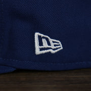 A close up of the New Era logo on the Los Angeles Dodgers Jackie Robinson Side Patch 59Fifty Black Bottom Fitted Cap