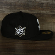 The wearer's right on the Chicago White Sox Jackie Robinson Side Patch 59Fifty Black Bottom Fitted Cap