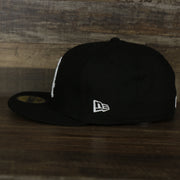 The wearer's left on the Chicago White Sox Jackie Robinson Side Patch 59Fifty Black Bottom Fitted Cap