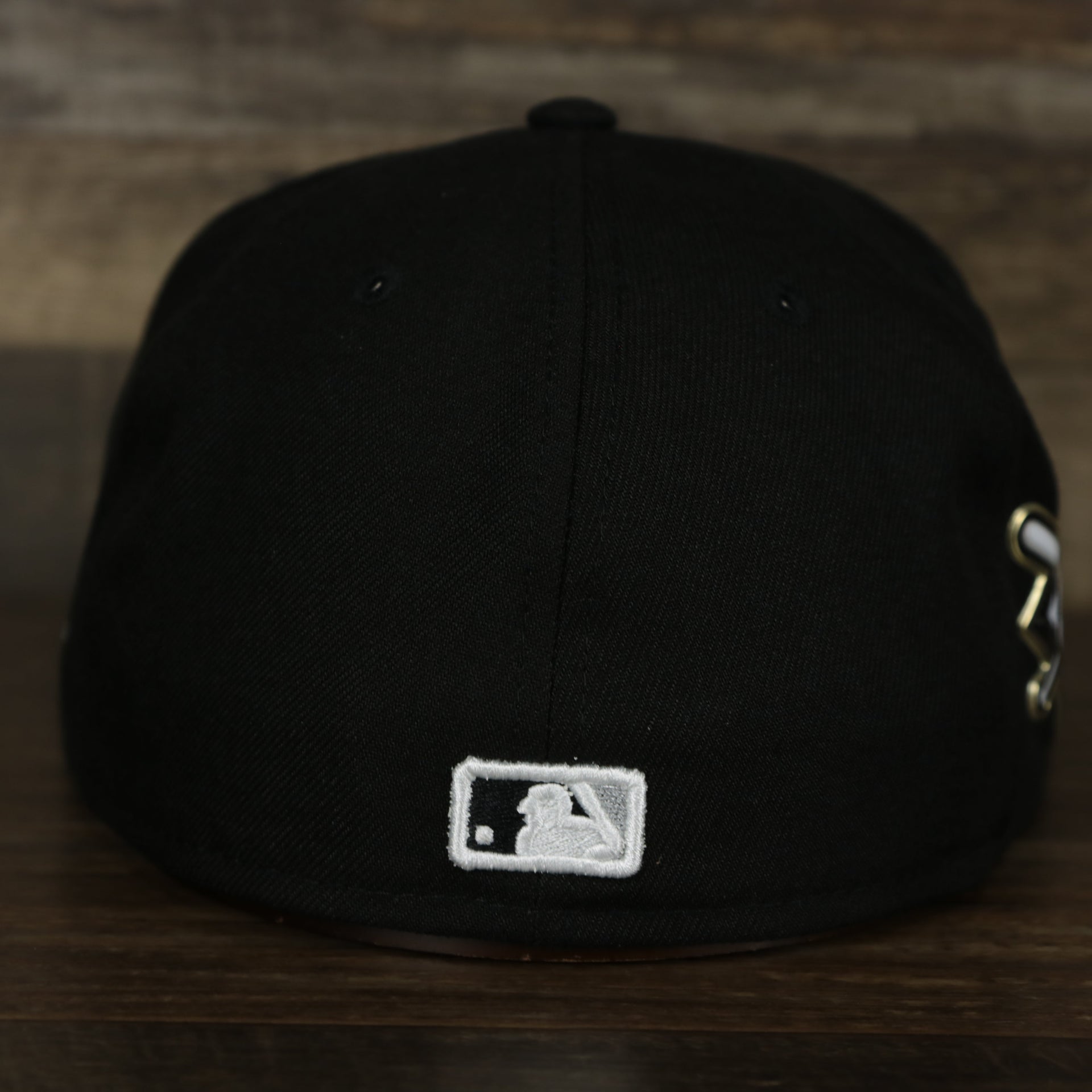 The backside of the Chicago White Sox Jackie Robinson Side Patch 59Fifty Black Bottom Fitted Cap