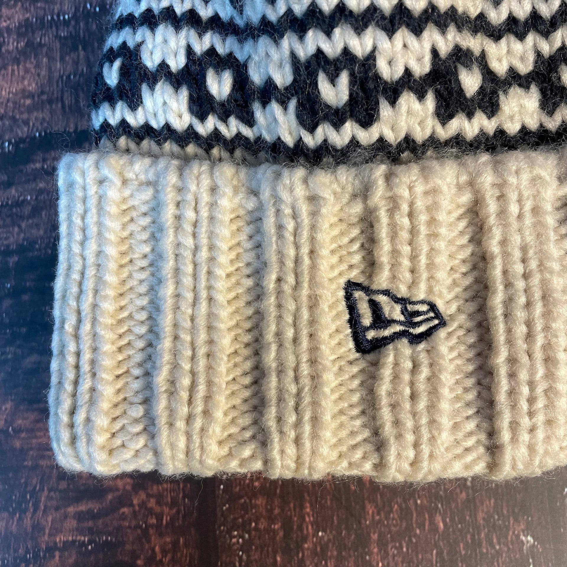 The wearer’s left of the Penn State Nittany Lions 2022 OSFM Beanie features a New Era logo embroidered in navy