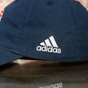 adidas logo on the side of the LA Galaxy American Flag Logo Navy Bottom MLS Slouch Cap | Navy OSFM