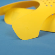 The sides on the Two Pack Yellow Sneaker Protectors Against Sneaker Creasing | Yellow Crease Shields
