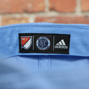 brand patch on the New York City Football Club Logo Light Blue Bottom MLS Slouch Cap | Light Blue OSFM