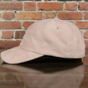 wearers left of the Cleveland Cavaliers Micro Suede Pink Dad Hat
